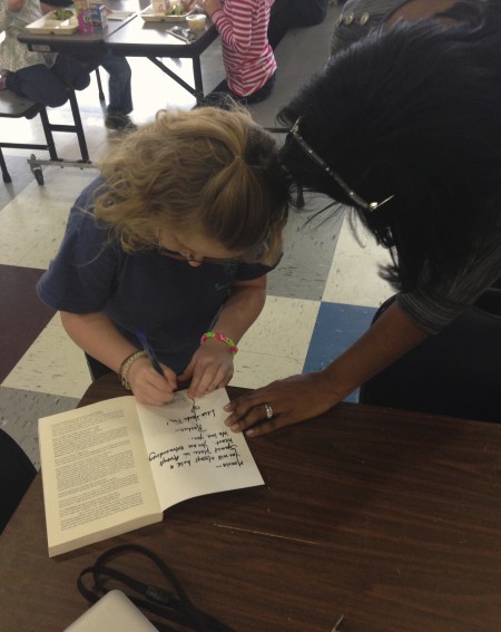 My daughter was asked to sign her mama's book at school the other day & the look of joy on her face made me a little teary!  